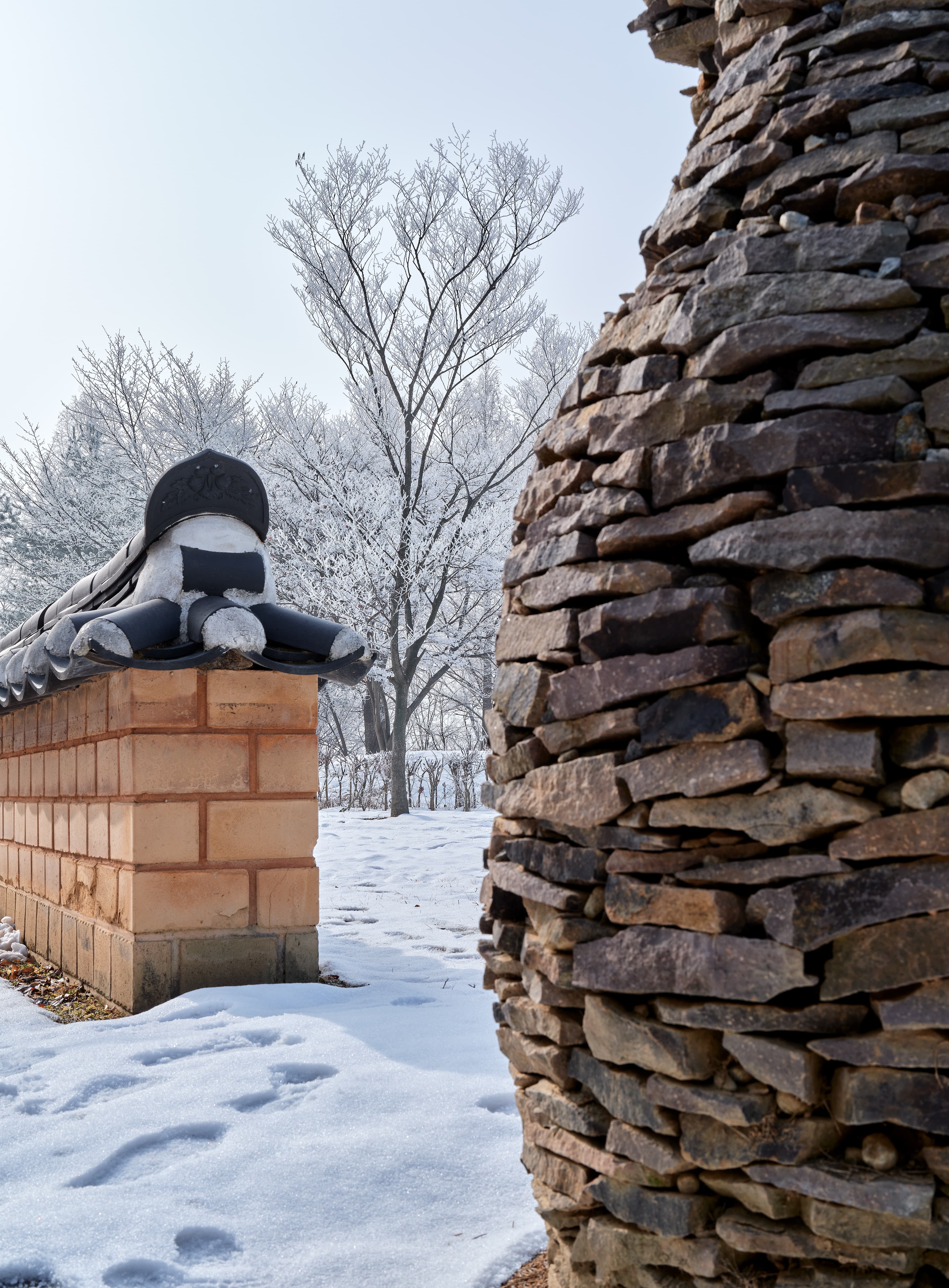 Traditional Korean Wall and Stone Sculpture in Winter