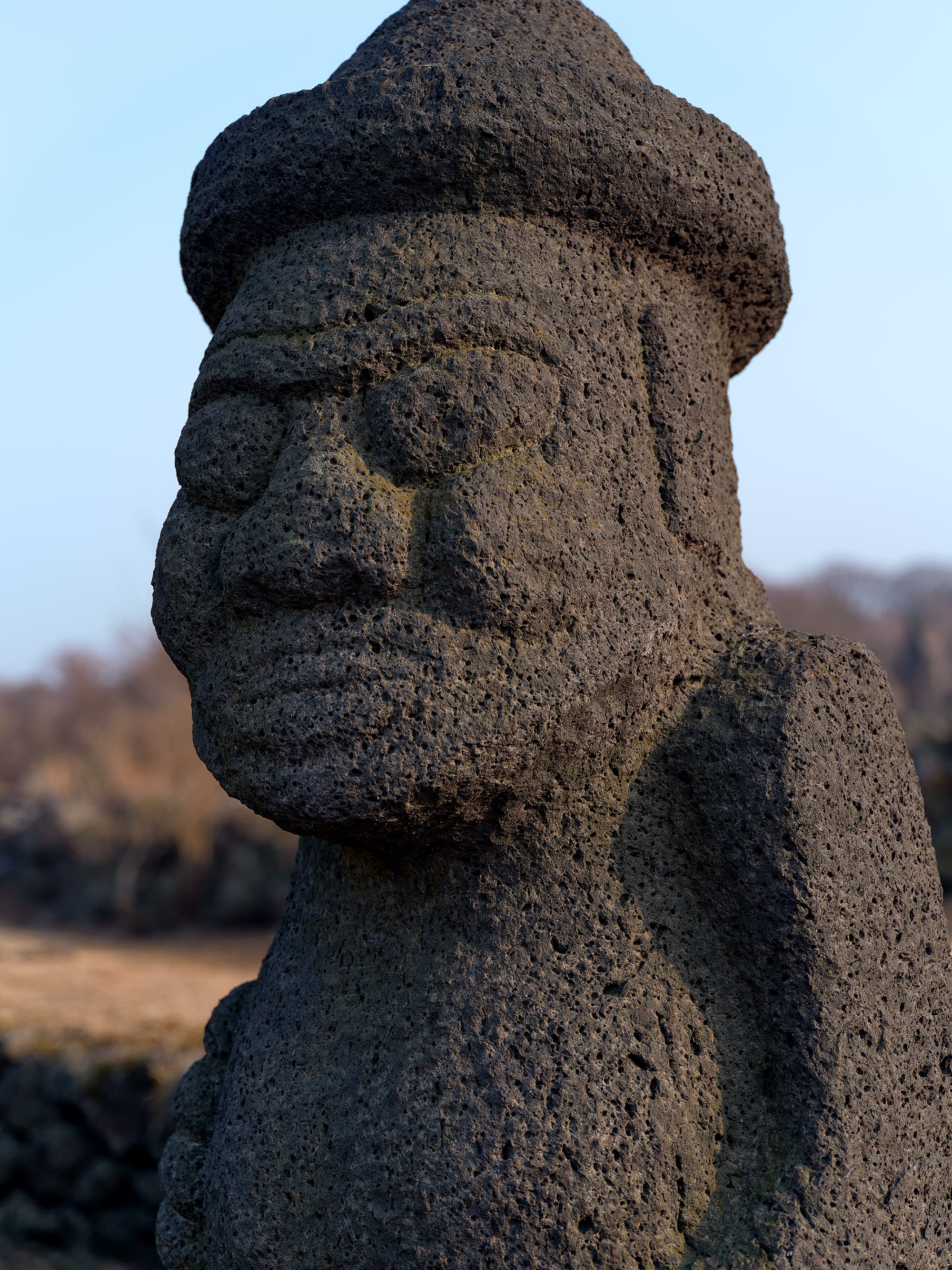 Close-up of a Dolharubang stone grandfather face