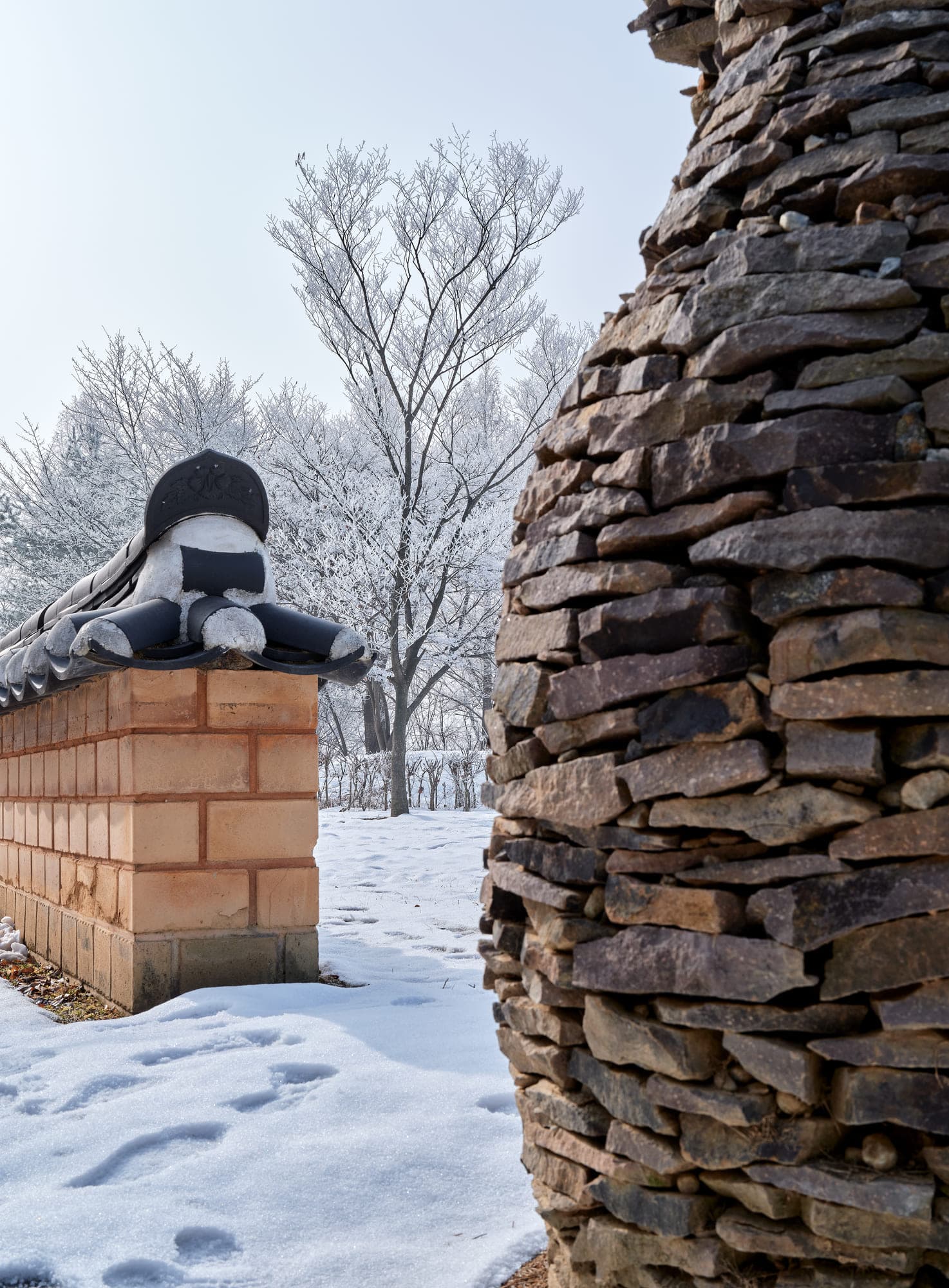 Traditional Korean Wall and Stone Sculpture in Winter